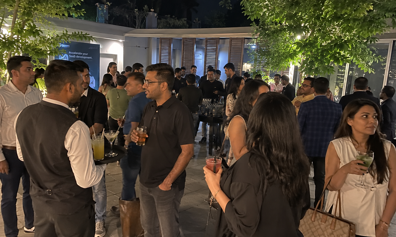 Corporate employees enjoying drinks at Annual Day celebration